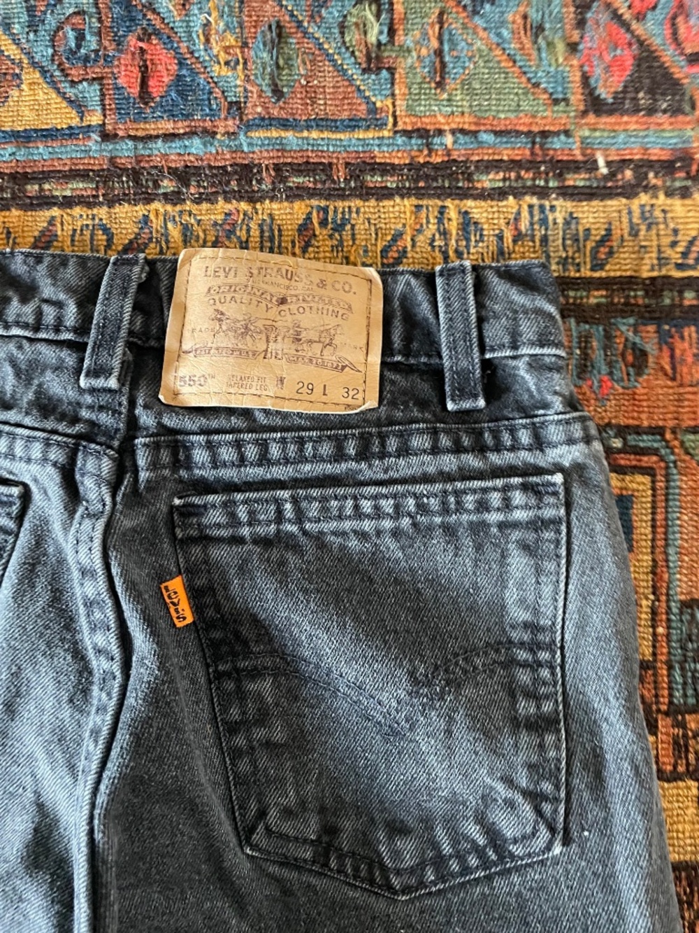 Vintage 90s Levi’s 550 Orange Tab Relaxed Fit Tapered Leg Black Jeans 26 x 32